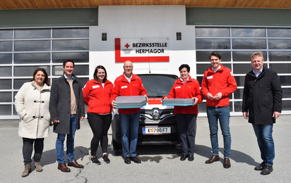 Gruppenfoto der freiwilligen Mitarbeiter:innen des Essenszustelldienstes Hermagor