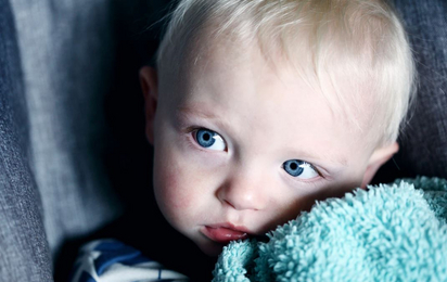 Kleinkind im Kinderwagen