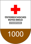 Auszeichnung für mehr als 1000 ehrenamtlich geleistete Stunden im Roten Kreuz: Rotkreuz-Logo mit dem Schriftzug "Österreichisches Rotes Kreuz - Steiermark" und der Zahl 1000 auf bronzenem Grund.